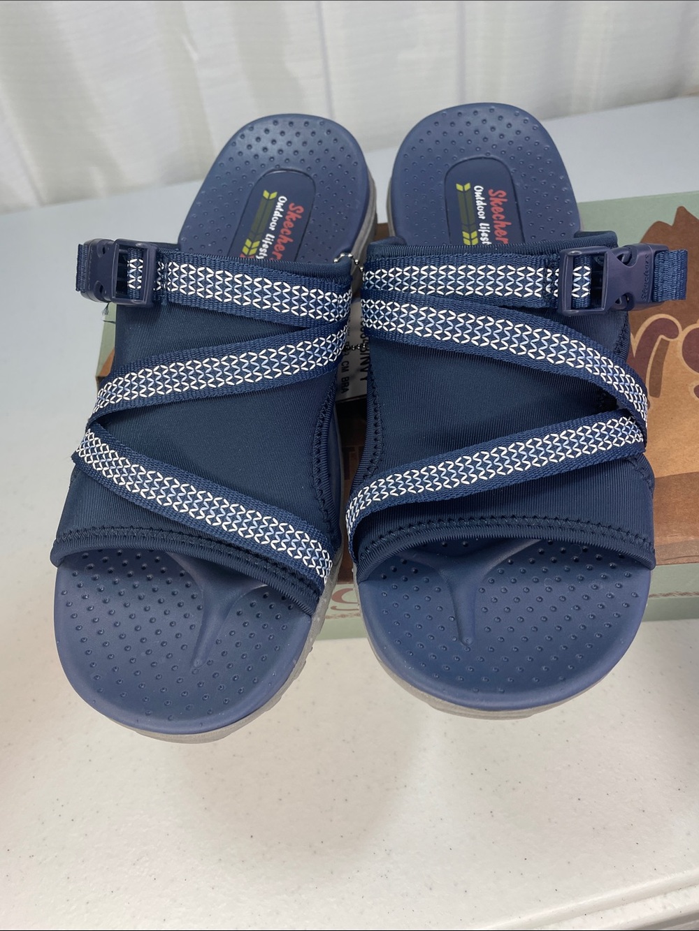 Skechers women’s Navy and White Slip-On Sport Sandals - Picture 8 of 9